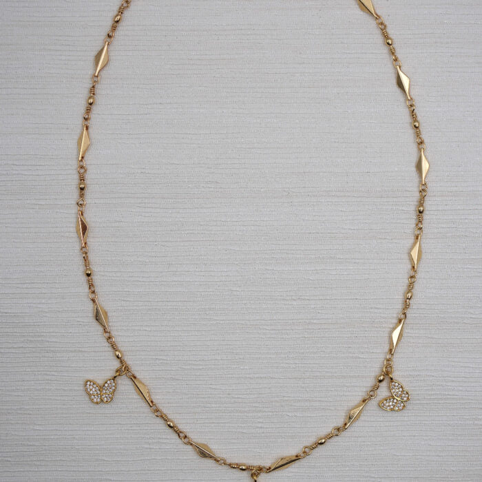 collier plaqué or papillon strassé