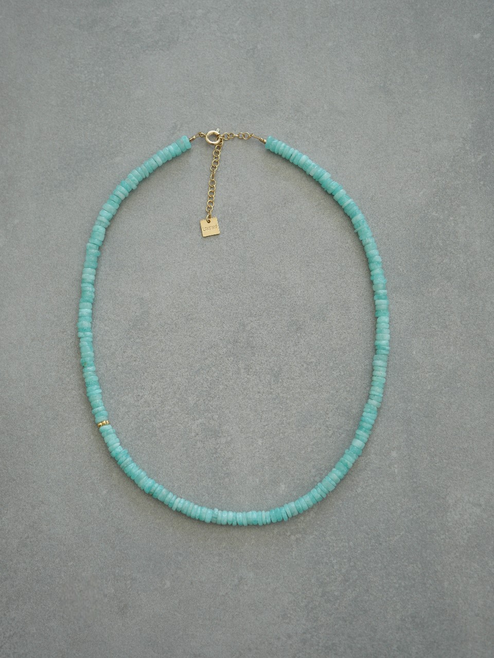 Collier en pierres semi précieuses et plaqué or